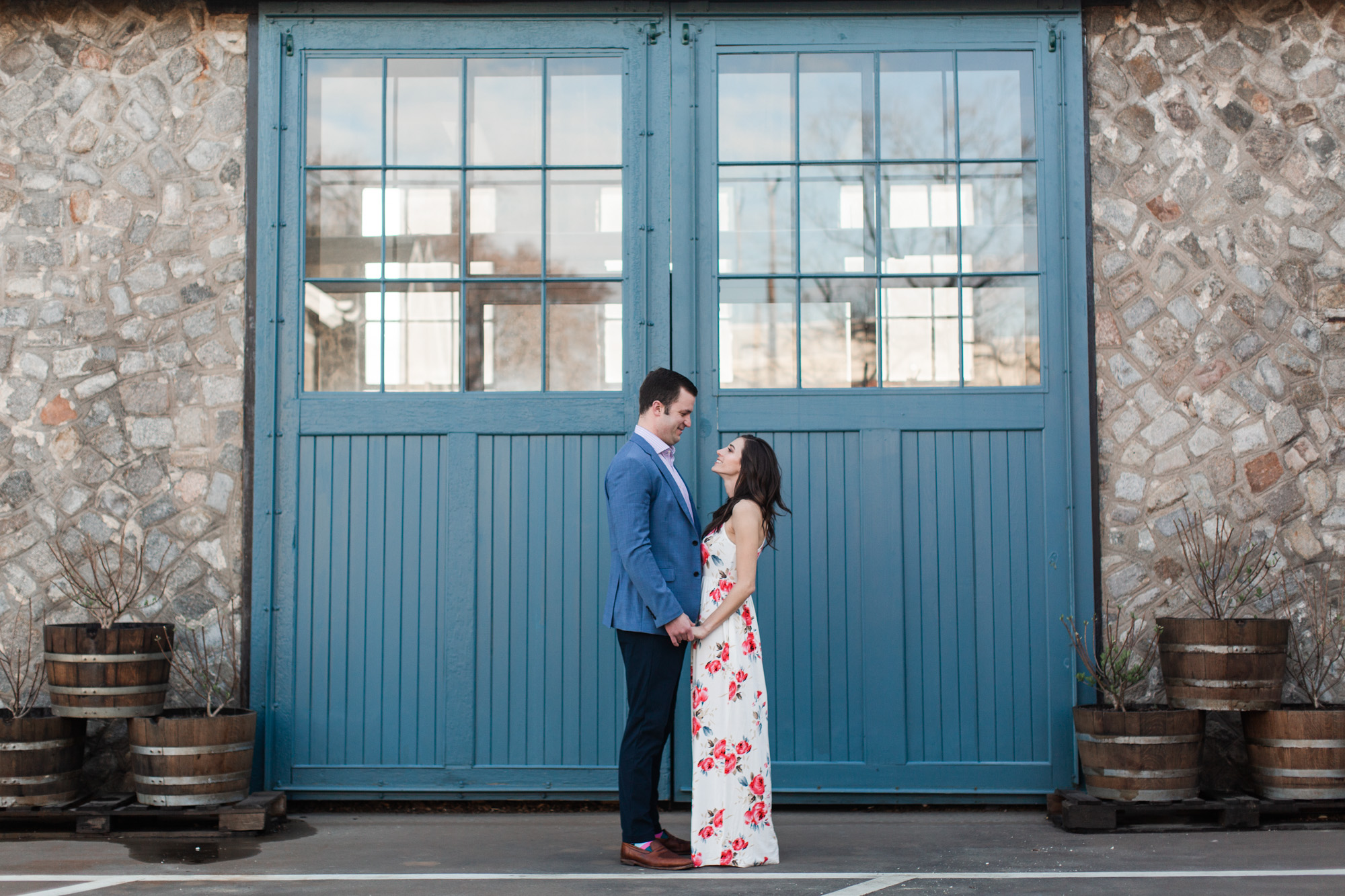 couple in front of blue door