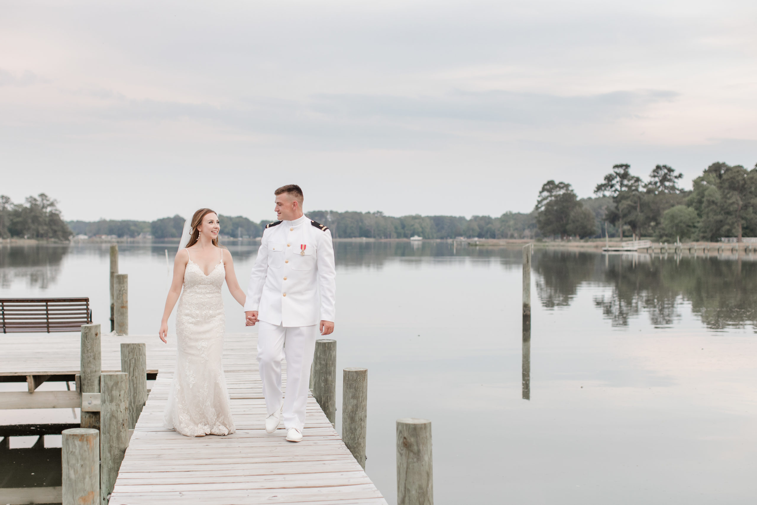 bride and groom on dock